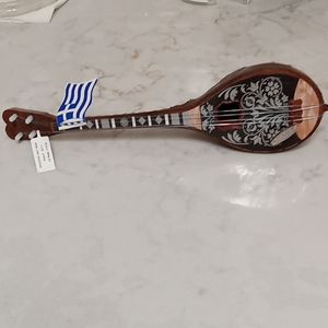 Greece Musical wind up mini guitar